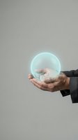 Mature male hand in dark business suit holding glowing translucent sphere against neutral background. Concept for innovation, technology, future vision, and business solutions.