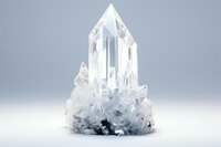 Clear quartz crystal cluster with pointed termination rises from rough base against neutral background, showcasing natural geometric formation and mineral growth.