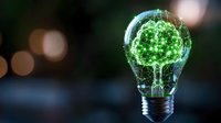 Glowing green tree inside light bulb against dark background with bokeh lights, symbolizing environmental innovation and green energy solutions.