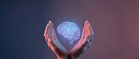 Hands cradling a glowing digital brain with circuit patterns, symbolizing artificial intelligence, innovation, and the future of technology.