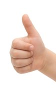 Thumbs up gesture isolated on white background, showing approval, success, and positive feedback for business, marketing, and motivational design projects.