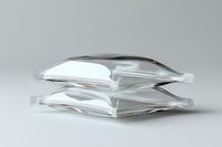 Minimalist stack of transparent acrylic or glass plates with subtle light reflections and shadows on neutral background, creating modern architectural form.