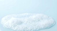 White powder isolated on light blue background, ready for design use on packaging, labels, cosmetics, pharmaceuticals, supplements, and educational materials.