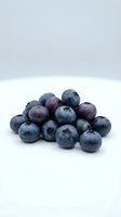 Fresh blueberries isolated on white background, ideal for food and nutrition content, healthy eating campaigns, recipe blogs, and culinary design projects.