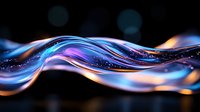 Luminous flowing waves with vibrant blue and purple colors against dark background create magical abstract light effect for modern design projects.