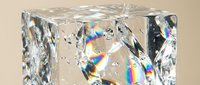 Luxury crystal glass cube with rainbow light reflections and prismatic effects on neutral background for elegant decor and optical design concepts.
