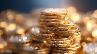 Stacked golden coins with soft bokeh background, macro shot showing texture and shine of metal currency. Financial wealth concept for banking and savings.