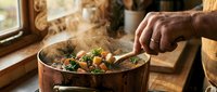 Steaming hot vegetable stir-fry being cooked in copper pan with wooden spoon, fresh ingredients sizzling in warm kitchen setting for healthy cooking.