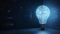 Glowing light bulb with digital network connections on futuristic technology background representing innovation and creative ideas in business.