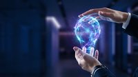 Hand holding glowing digital globe with network connections, representing global technology, innovation, and worldwide business communication in modern corporate environment.