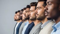 Diverse group of professional men standing in line, multicultural business team representing unity, leadership and corporate collaboration in modern workplace.