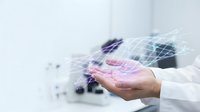 Healthcare professional holding digital network connections with futuristic technology interface for medical innovation and telemedicine applications.