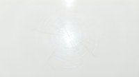 Minimalist white geometric triangle with radiating light rays on subtle textured background for modern design projects and branding materials.