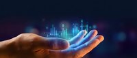Digital financial data glowing in open palm against dark background, representing investment growth, stock market analysis, and business analytics for financial technology concepts.