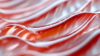 Smooth flowing waves in red and white create abstract organic pattern with soft gradient transitions and gentle curves, suggesting liquid motion and dynamic movement.