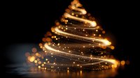 Abstract golden Christmas tree made of glowing light trails and sparkles on dark background for holiday greeting cards and festive decorations.