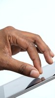 Close-up of male hand with medium skin tone using touchscreen device, isolated on white background for design and technology concepts.