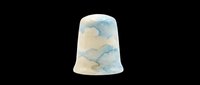 Watercolor thimble with soft blue and cream cloud patterns, isolated on transparent background. Ready for clipart, print-on-demand products, stickers, and sublimation designs.