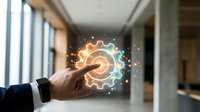 Businessman hand touching glowing gear icon with digital particles and light effects in modern office space for technology and innovation concepts.