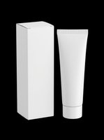Blank white cosmetic tube and box mockup isolated on transparent background, ready for branding, packaging design, print on demand, and product presentation.