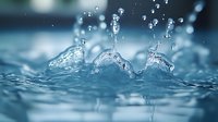 Macro shot of water drops splashing and creating crown-like formations on blue water surface with multiple droplets frozen in motion, showing liquid dynamics.