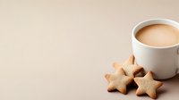 Cozy morning scene with star shaped cookies and cup of coffee with milk on beige background. Minimalist food photography with copy space.