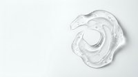 Clear gel or serum swirl with water droplets on white background, isolated cosmetic product for skincare, beauty, and wellness design applications.