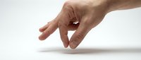 Close-up of male hand with fingers extended downward on white surface, isolated for design use on merchandise and promotional materials.