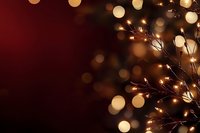 Warm golden fairy lights with glowing bokeh effects on dark background creating festive holiday atmosphere for seasonal decorations and celebrations.