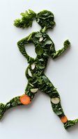 Creative food art showing running figure made from fresh kale leaves and carrots on white background, representing healthy lifestyle and fitness nutrition.