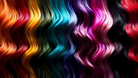 Vibrant wavy hair strands in rainbow colors arranged horizontally showing different dye techniques and hair coloring possibilities on black background.
