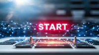 Business startup concept with glowing START text and digital network connections on laptop keyboard for entrepreneurship and innovation projects.