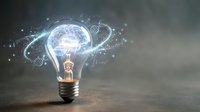 Glowing light bulb with digital brain and circuit patterns representing artificial intelligence, innovation, creativity, and futuristic technology concepts.