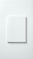Blank white paper sheet on textured background with soft shadow for mockup design and branding projects.