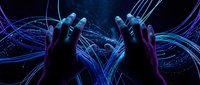 Human hands manipulating glowing blue digital energy streams and light trails in futuristic cyberspace environment for technology concepts.