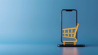 Smartphone with shopping cart icon on blue background, minimalist composition showing mobile commerce and online shopping concept. Digital retail concept.