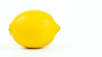 Fresh yellow lemon fruit isolated on white background for culinary and healthy cooking designs.