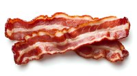Crispy cooked bacon strips with golden brown edges and marbled fat streaks isolated on white background for culinary and breakfast designs.