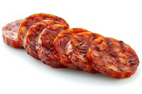 Sliced spicy chorizo sausage with paprika and garlic on white background, traditional Spanish cured meat isolated for culinary design and packaging.