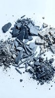 Crushed charcoal, ash, and coal fragments scattered on white background, suitable for environmental, industrial, and educational content.