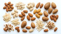 Assorted nuts including almonds, cashews, and peanuts arranged on white background, ready for food, nutrition, and healthy eating design projects.