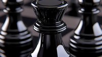 Black chess queen piece in focus with other pieces blurred in background, dramatic lighting highlights glossy surface and strategic positioning on board.