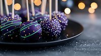 Purple cake pops decorated with colorful sprinkles and stripes on dark plate with bokeh lights in background, festive dessert for party celebration.