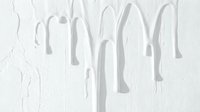 White paint dripping down textured wall surface creating abstract liquid flow pattern for modern interior design and artistic backgrounds.