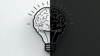 Creative light bulb with brain halves in black and white contrast showing concept of different thinking styles and innovation on isolated background.
