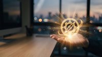 Businessman hand holding glowing golden network connection sphere with sparkling lights against blurred city skyline at sunset for technology concepts.