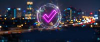 Glowing neon checkmark symbol with circular light effects floating over blurred city skyline at night for business success and approval concepts.