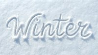 Word Winter written in fresh white snow surface, seasonal cold weather concept for holiday greeting cards and winter designs.