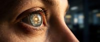 Extreme close-up of human eye with golden light reflection, showing detailed iris texture and eyelashes. Suitable for healthcare, vision, ophthalmology, and medical education materials.
