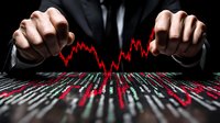 Male hands manipulating financial market data visualization with glowing red graph line showing market volatility against dark background for business concept.